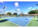 Well-maintained outdoor tennis court with professional lines and lighting at 9235 N 101St St, Scottsdale, AZ 85258