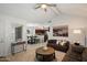 Open-concept living area leading to the dining room and kitchen, with neutral tones and ample space at 10115 E Mountain View Rd # 2061, Scottsdale, AZ 85258