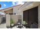 Private patio area with a seating area, perfect for relaxing and enjoying the outdoors at 10115 E Mountain View Rd # 2061, Scottsdale, AZ 85258