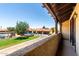 Balcony overlooking a well-maintained community with pool, green spaces, and parking at 10235 N 31St St # 2, Phoenix, AZ 85028