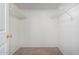 Walk-in closet with adjustable wire shelving and a carpeted floor at 10235 N 31St St # 2, Phoenix, AZ 85028