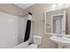 Bathroom featuring a shower and bath, a white pedestal sink, and a large mirror at 10617 W Ross Ave, Peoria, AZ 85382