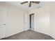 Neutral bedroom with carpet and an open doorway leading to another room at 10617 W Ross Ave, Peoria, AZ 85382