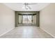 Bonus room with a large bay window overlooking the backyard, and neutral tile flooring at 10617 W Ross Ave, Peoria, AZ 85382