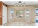 Bright dining area showcasing a beautiful bay window with views of the backyard at 10617 W Ross Ave, Peoria, AZ 85382