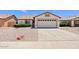 Charming single-story home featuring a two-car garage, desert landscaping, and a well-maintained yard at 10617 W Ross Ave, Peoria, AZ 85382