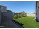 Clean backyard featuring artificial grass at 10964 W Garfield St, Avondale, AZ 85323