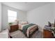 Cozy bedroom with natural light and comfortable furnishings at 10964 W Garfield St, Avondale, AZ 85323