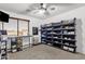 Bedroom with work space and lots of storage bins at 1130 E Harvest Rd, San Tan Valley, AZ 85140
