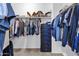 Walk-in closet with custom shelving and plenty of room for organization at 1130 E Harvest Rd, San Tan Valley, AZ 85140