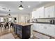 Spacious kitchen with center island, stainless steel appliances, and white cabinets at 1130 E Harvest Rd, San Tan Valley, AZ 85140