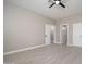 Spacious bedroom featuring tile flooring and neutral paint colors at 11615 N 77Th Dr, Peoria, AZ 85345