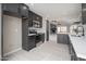 Modern kitchen featuring stainless steel appliances and sleek gray cabinets at 11615 N 77Th Dr, Peoria, AZ 85345