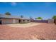 The backyard features a graveled ground cover, fenced perimeter, and a storage shed at 1165 E Ivanhoe St, Chandler, AZ 85225