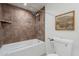 Cozy bathroom featuring a tiled shower, soaking tub, and modern fixtures for a relaxing experience at 1165 E Ivanhoe St, Chandler, AZ 85225