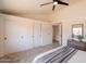 Spacious bedroom featuring a large closet, neutral carpet, and plenty of storage space at 1165 E Ivanhoe St, Chandler, AZ 85225