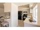 Updated kitchen with gray cabinets, modern appliances, and an open layout at 1165 E Ivanhoe St, Chandler, AZ 85225