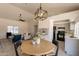 Bright, open-concept living room and kitchen with modern decor and updated appliances at 1165 E Ivanhoe St, Chandler, AZ 85225