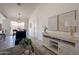 Open-concept living room with stylish decor, neutral walls, and seamless flow to the dining area for entertaining at 1165 E Ivanhoe St, Chandler, AZ 85225