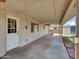 Back covered patio with concrete floors and a view of the property and shed at 1306 W 12Th St, Tempe, AZ 85281