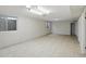 Basement with a tiled floor, neutral-colored walls, and an egress window at 1306 W 12Th St, Tempe, AZ 85281