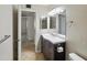 Bathroom vanity with a modern sink, mirror, and ample cabinet space at 1306 W 12Th St, Tempe, AZ 85281