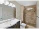 Bathroom with a walk-in shower, tiled flooring, and vanity sink at 1306 W 12Th St, Tempe, AZ 85281