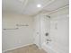 Bathroom featuring a tub and shower combo with tile flooring and neutral colored walls at 1306 W 12Th St, Tempe, AZ 85281