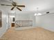 Open dining area featuring tile floors, updated light fixture and view to the bathroom at 1306 W 12Th St, Tempe, AZ 85281