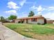 Inviting single-story home with a well-manicured lawn and tidy landscaping at 1306 W 12Th St, Tempe, AZ 85281