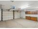 Spacious two-car garage with cabinet storage at 1306 W 12Th St, Tempe, AZ 85281