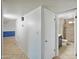 Hallway with tiled flooring and a partial view of the bathroom at 1306 W 12Th St, Tempe, AZ 85281