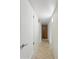 Hallway with tiled flooring and a small storage space at 1306 W 12Th St, Tempe, AZ 85281
