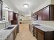 Kitchen with granite countertops and stainless steel appliances offers views to other rooms at 1306 W 12Th St, Tempe, AZ 85281