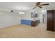 Bright kitchen features tile flooring, dark wood cabinets, and stainless steel appliances at 1306 W 12Th St, Tempe, AZ 85281