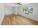Open living room featuring hardwood floors, light walls, and a window at 1306 W 12Th St, Tempe, AZ 85281