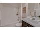 Clean, bright bathroom featuring a bathtub and shower, and neutral decor at 13145 W Whisper Rock Trl, Peoria, AZ 85383