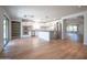 Open kitchen featuring stainless steel appliances, a center island, and seamless transition to living areas at 13601 W Hearn Rd, Surprise, AZ 85379