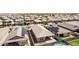 An aerial view of a home showcasing a neutral-toned roof and fenced backyard area at 15078 W Mckinley St, Goodyear, AZ 85338