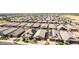 Residential neighborhood filled with neutral-toned homes, landscaping and paved streets at 15078 W Mckinley St, Goodyear, AZ 85338