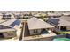 The backyard has desert landscaping and a covered patio to enjoy the weather at 15078 W Mckinley St, Goodyear, AZ 85338