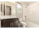 Bathroom featuring a vanity with a sink, toilet, and shower/tub combination at 15078 W Mckinley St, Goodyear, AZ 85338