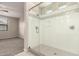 Modern bathroom with glass-enclosed shower and neutral finishes at 15078 W Mckinley St, Goodyear, AZ 85338