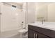 Bright bathroom featuring a tub and shower combination and a modern vanity at 15078 W Mckinley St, Goodyear, AZ 85338
