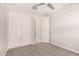 Bedroom with a closet and entry to another room at 15078 W Mckinley St, Goodyear, AZ 85338