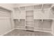 Walk-in closet featuring white shelving and ample storage space at 15078 W Mckinley St, Goodyear, AZ 85338