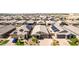 Exterior shot of a home with desert landscaping, a two-car garage, and paved driveway at 15078 W Mckinley St, Goodyear, AZ 85338