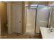 Bathroom featuring a shower with sliding glass doors, and a vanity with sink at 16126 N 159Th Dr, Surprise, AZ 85374