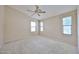 Bright bedroom with a ceiling fan and large windows with natural light at 16126 N 159Th Dr, Surprise, AZ 85374