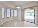 Bright dining area with sliding doors to the patio and a view of the backyard at 16126 N 159Th Dr, Surprise, AZ 85374